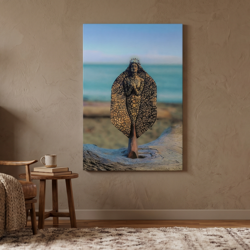 Room interior with a chair, table, and wall art of an origianl sculpture