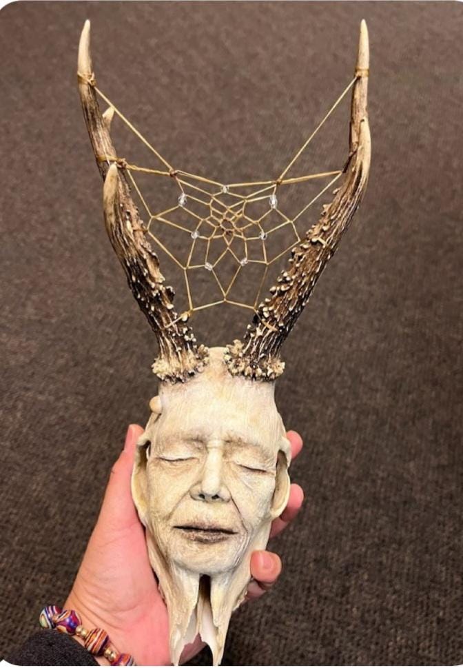 Beauty in Death, Horned Skull Woman, with Dreamcatcher. Sculpture by Debra Bernier