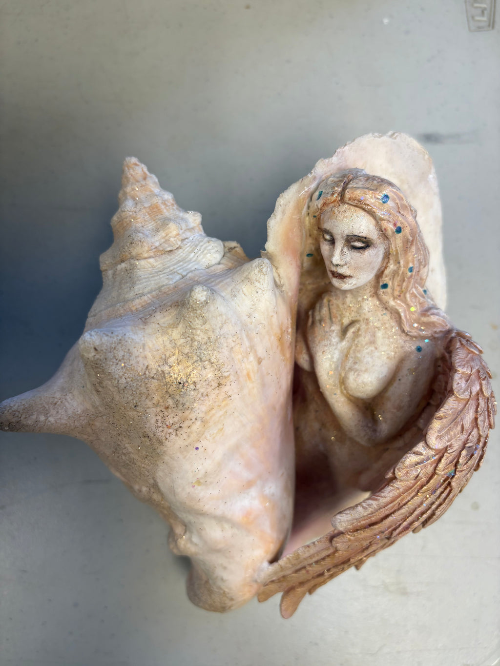 Angel in Conch Shell