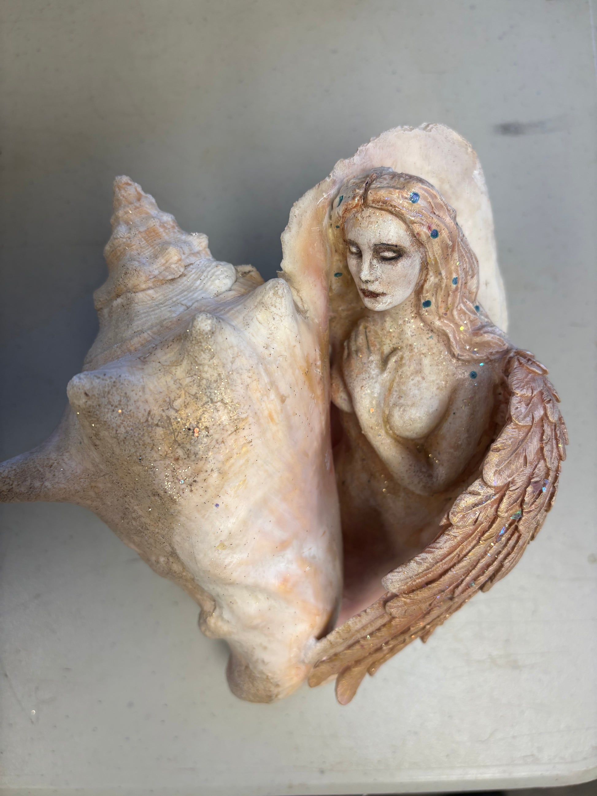 Angel in Conch Shell