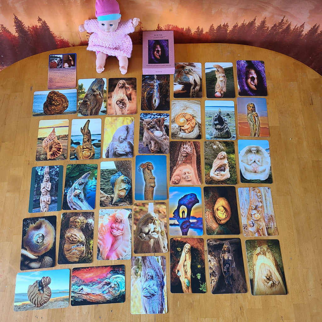 Spread of Birth Journey Deck cards showing nurturing artwork and inspirational prompts