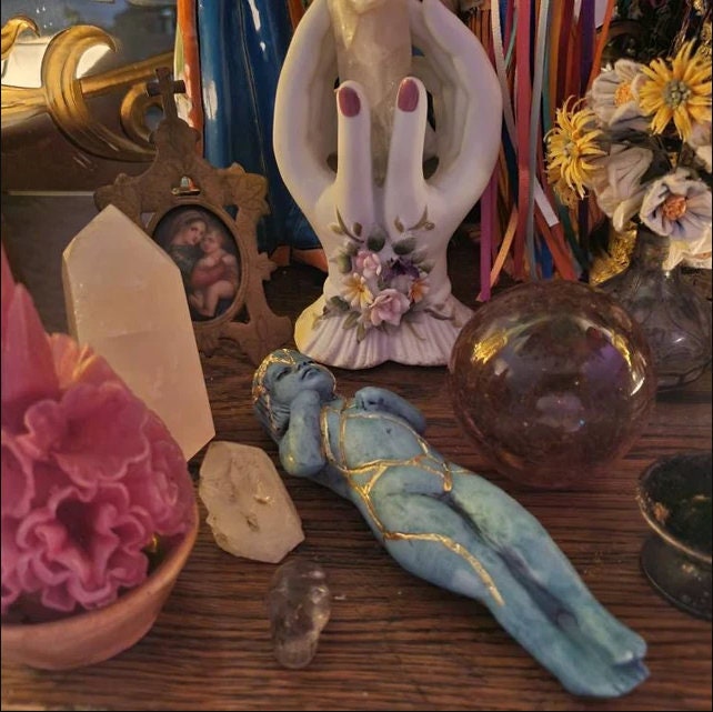 Kintsugi Child healing sculpture styled in meaningful home decor and meditation space