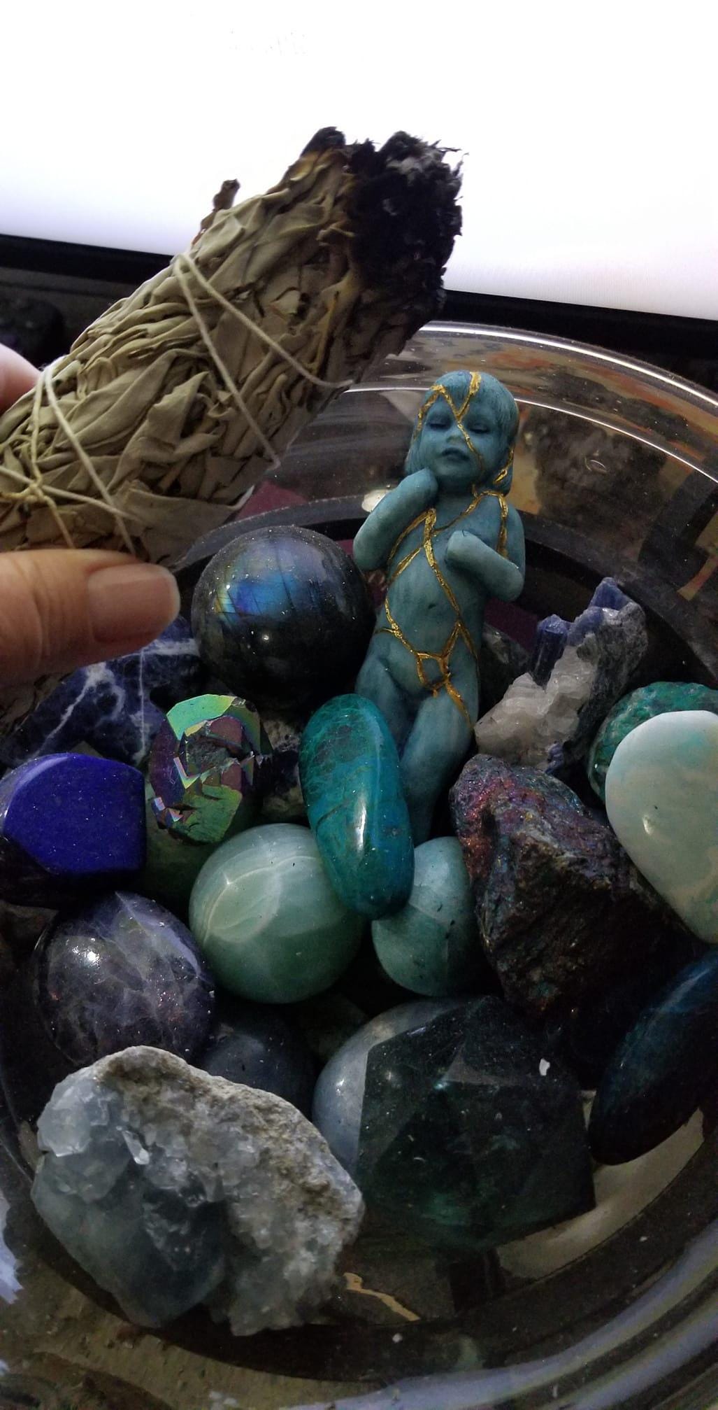 Kintsugi Child healing sculpture styled in meaningful home decor and meditation space