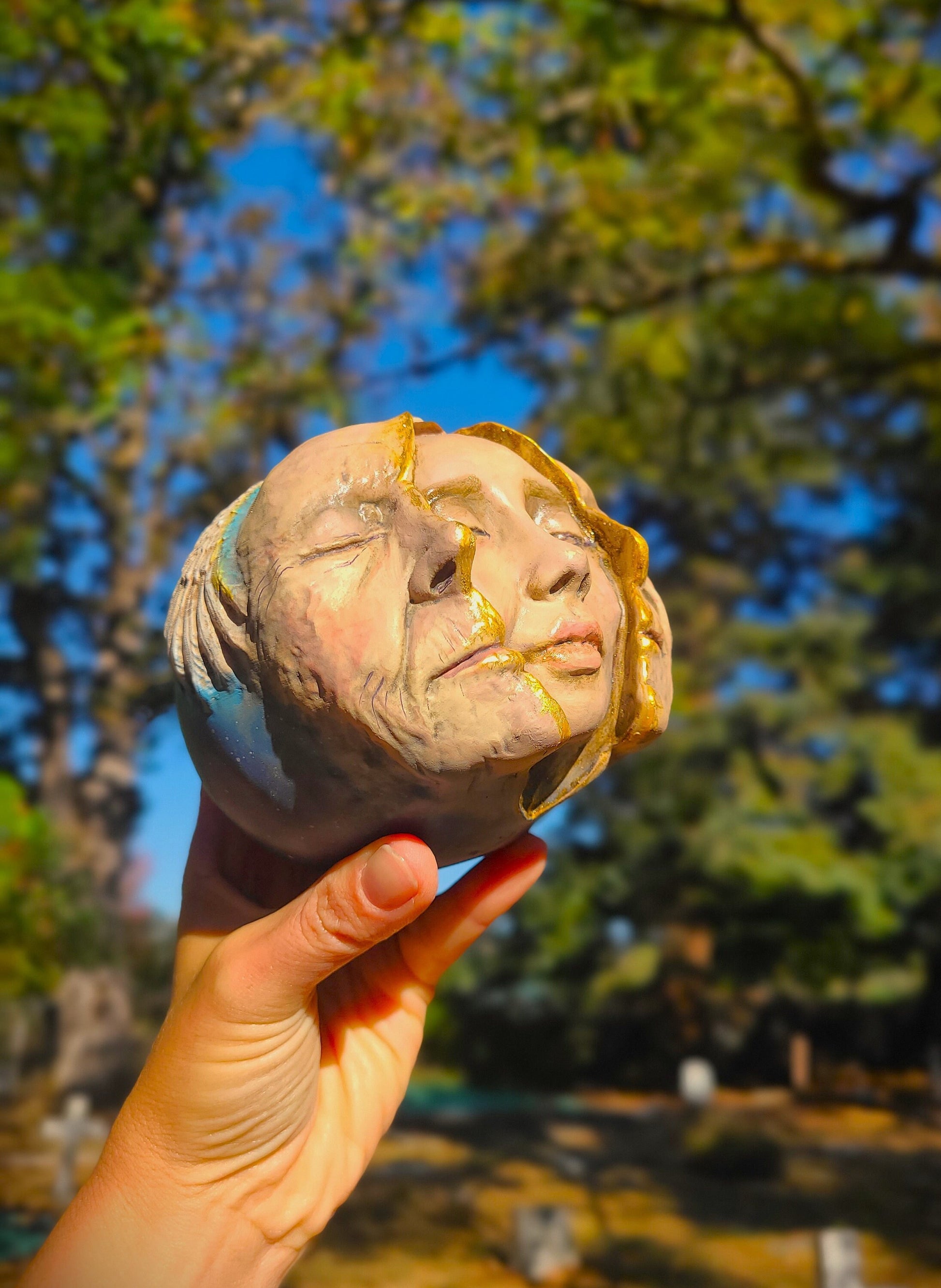 Side view of Memories in Me sculpture showing layered sculptural form and organic texture detail