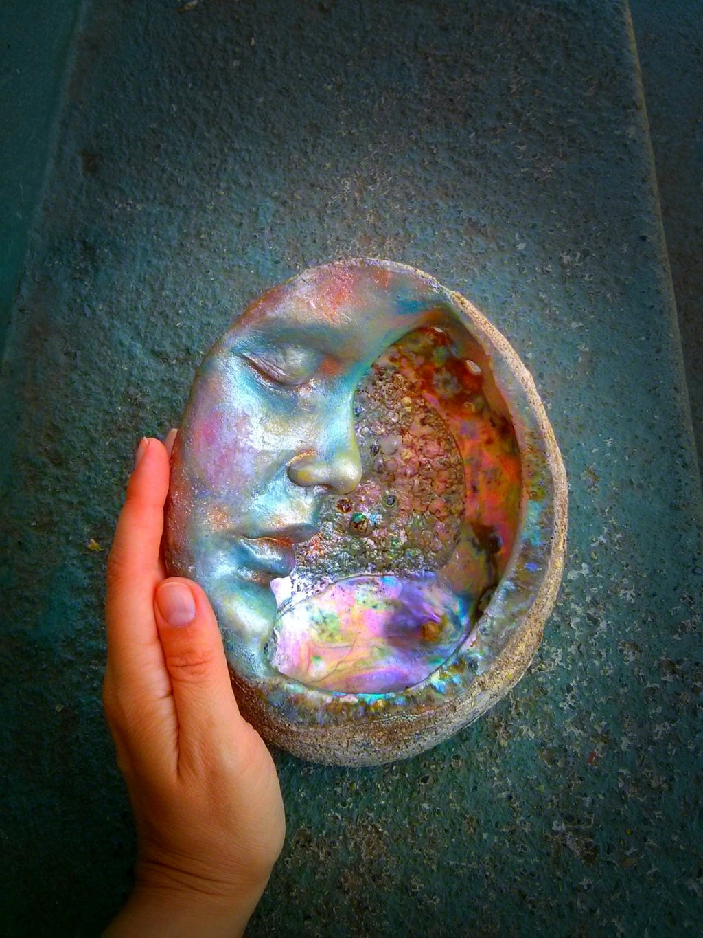 Moon of New Beginnings abalone moon sculpture shown for scale and dimensional presence