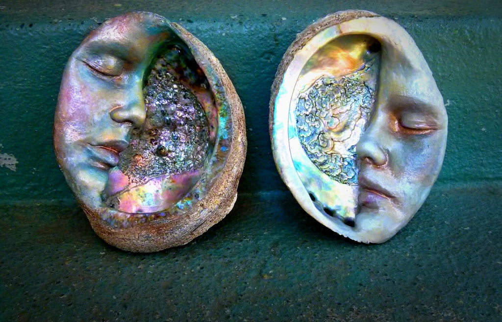 Front detail view of Moon of New Beginnings abalone moon sculpture highlighting sculptural form