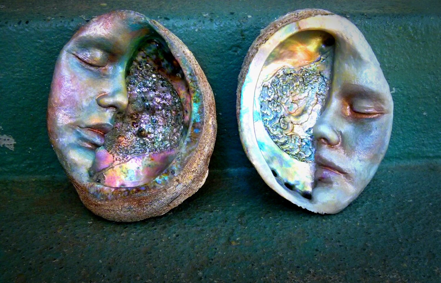 Front detail view of Moon of New Beginnings abalone moon sculpture highlighting sculptural form