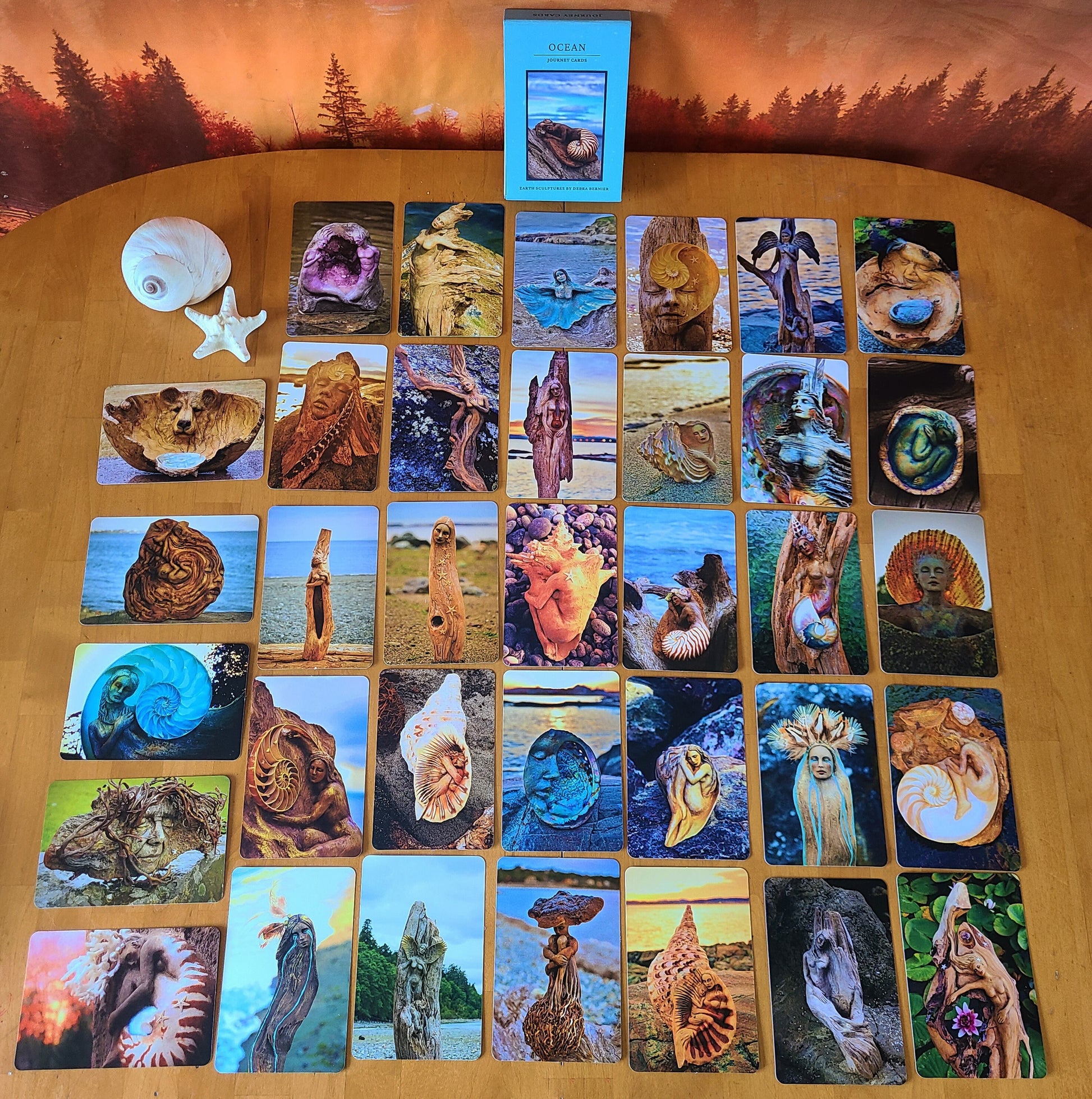 Spread of Ocean Journey Deck cards showing ocean inspired artwork and reflective prompts