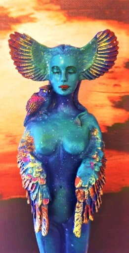 Close up of facial expression and sculpted detail on Owl Goddess sacred feminine sculpture