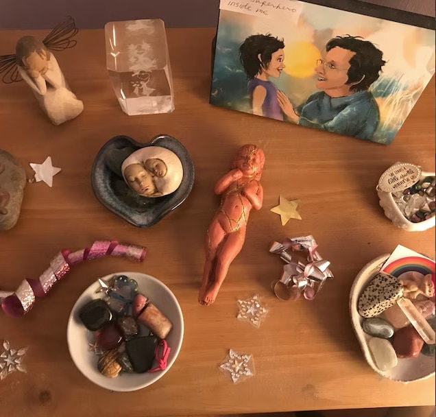 Pink Kintsugi healing sculpture styled in meaningful home decor and meditation space