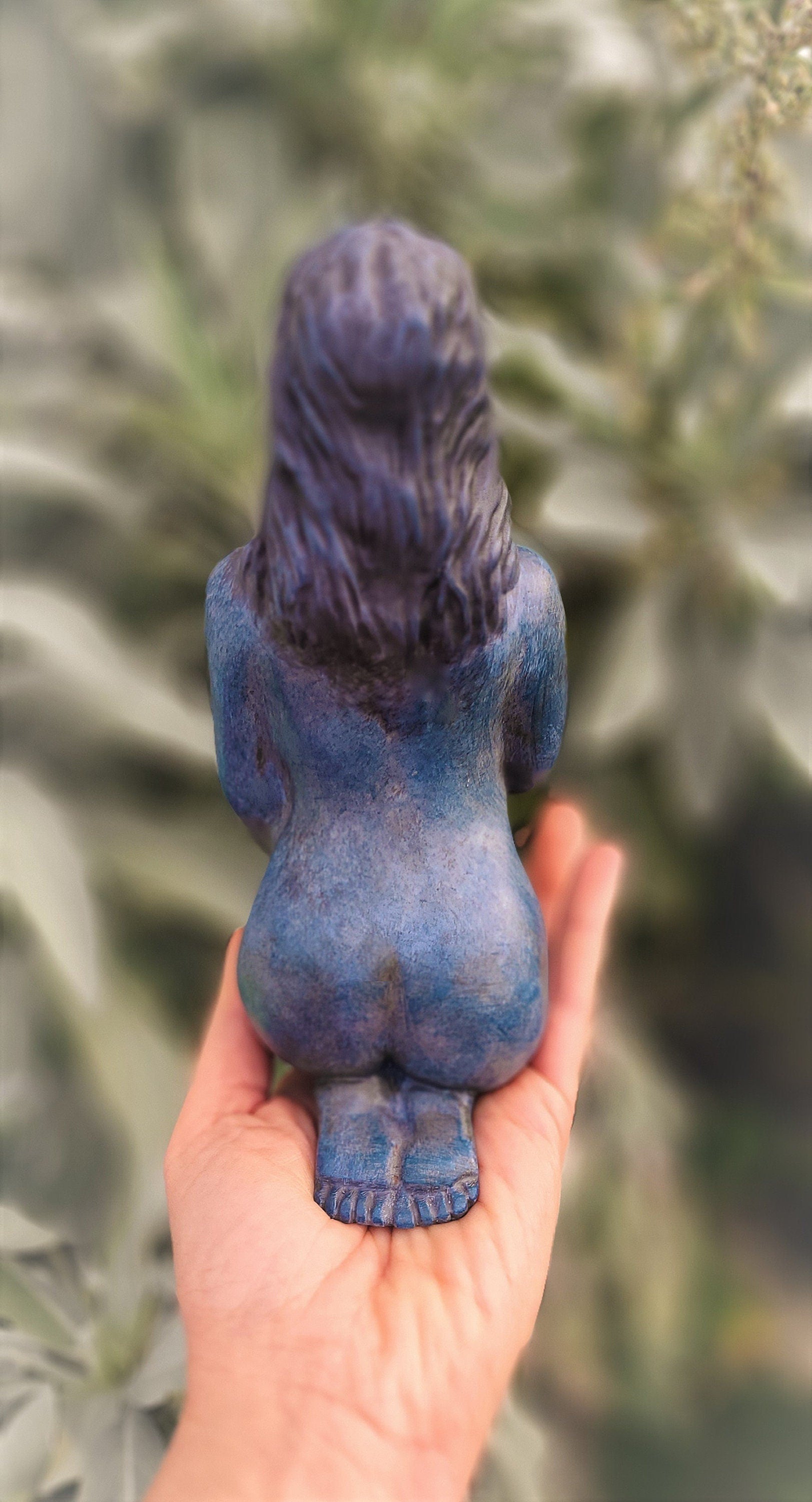 Detail view of backside and sculptural form on Self Love blue feminine sculpture