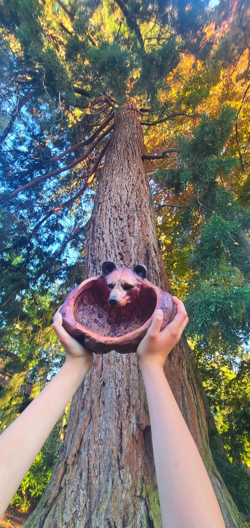 Side profile of Spirit Bear Bowl highlighting bear silhouette and organic sculptural form